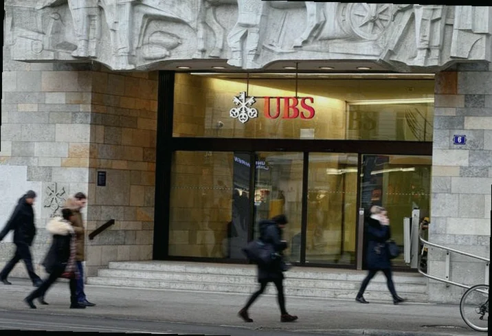 ubs-shares-climb-swiss-lawmakers-05ec