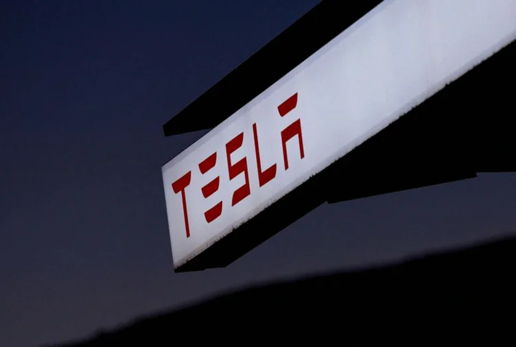 tesla-stock-edges-higher-report-b24d