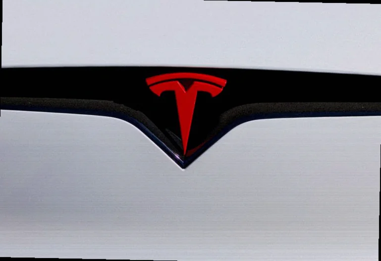 tesla-stock-upgraded-ubs-more-60a4