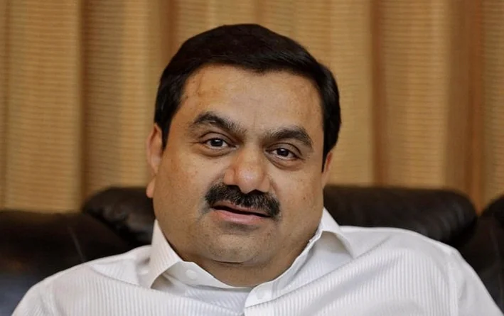 adani-stocks-volatile-after-reports-2516